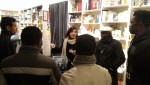 I rifugiati politici mentre concludono la visita al bookshop di Palazzo dei Diamanti